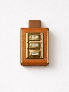 Vintage French mechanical perpetual calendar clip from the 1940s-1960s,